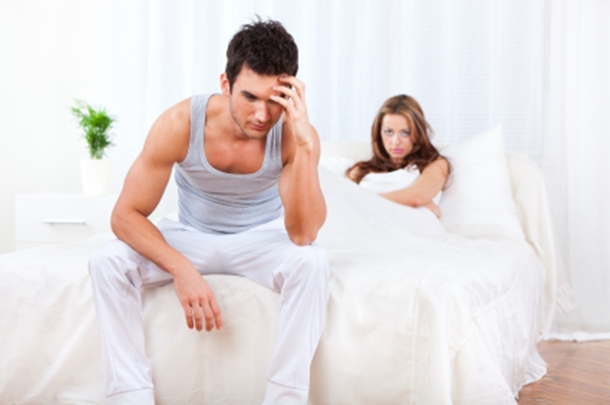 Frustrated Couple in Bed