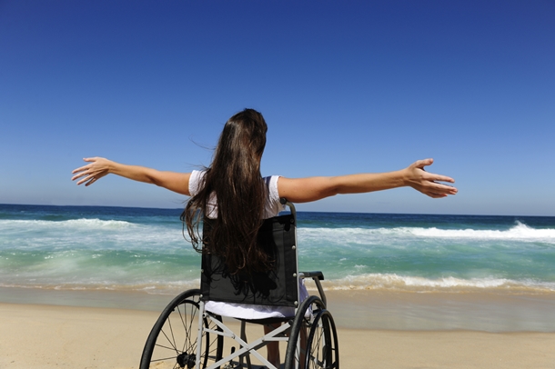 Woman in Wheelchair on Beach